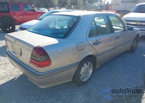 1999 Mercedes-Benz C 230 Kompressor из США, поврежденный, VIN WDBHA24G2XA686676